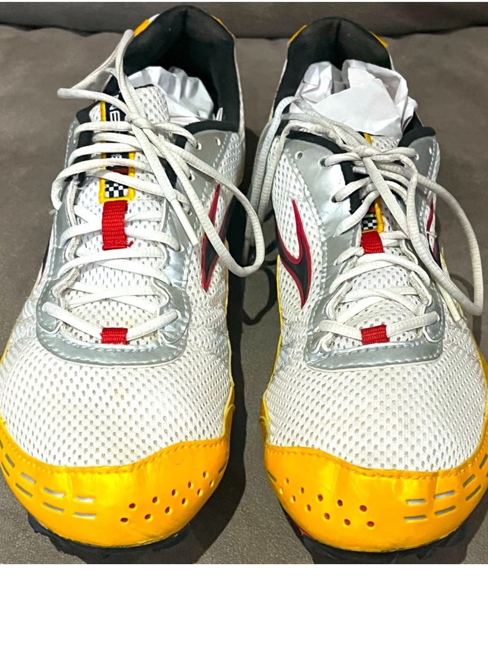 Brooks White Mesh Sneakers with Yellow Toe and Red Accents